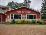 A view of the front of the Twin Bay Resort Restaurant and Bar in summer time.